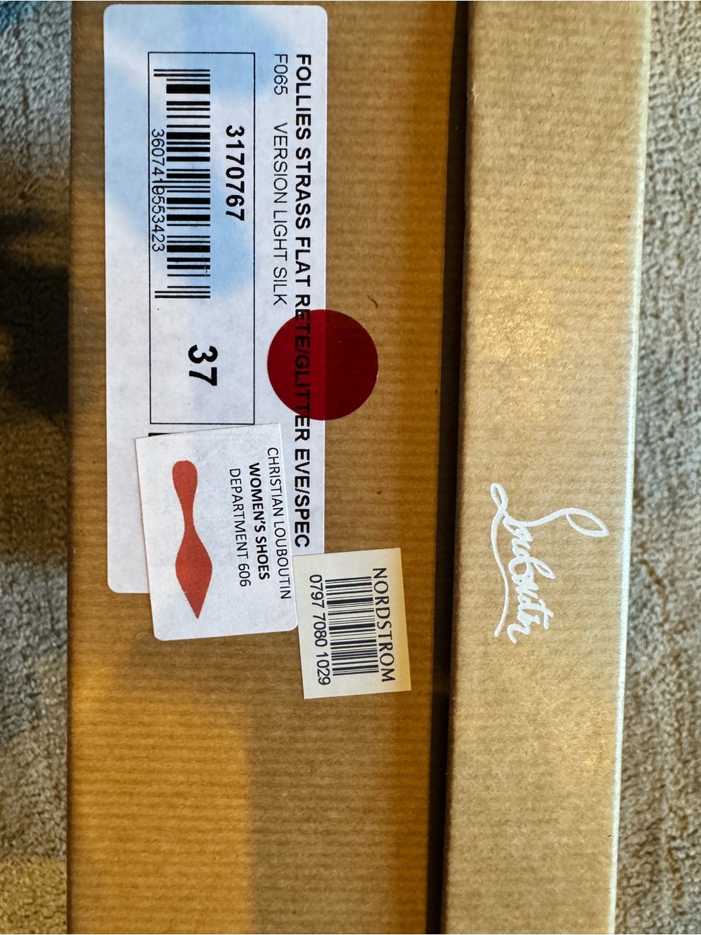 Christian Louboutin Gold Box with Red Accents